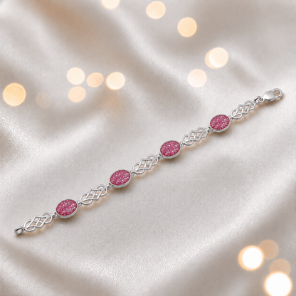 Asteria Bracelet — silver Celtic-style ashes memorial bracelet in rose pink, handcrafted in Lancashire, UK