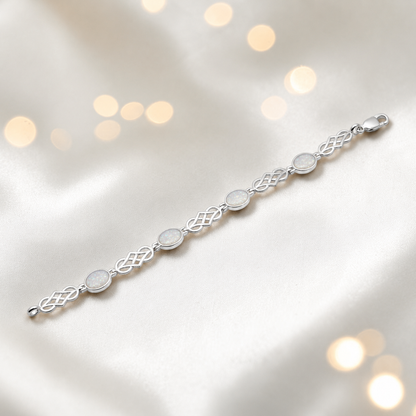 Asteria Bracelet — silver Celtic-style ashes memorial bracelet in white snow, handcrafted in Lancashire, UK