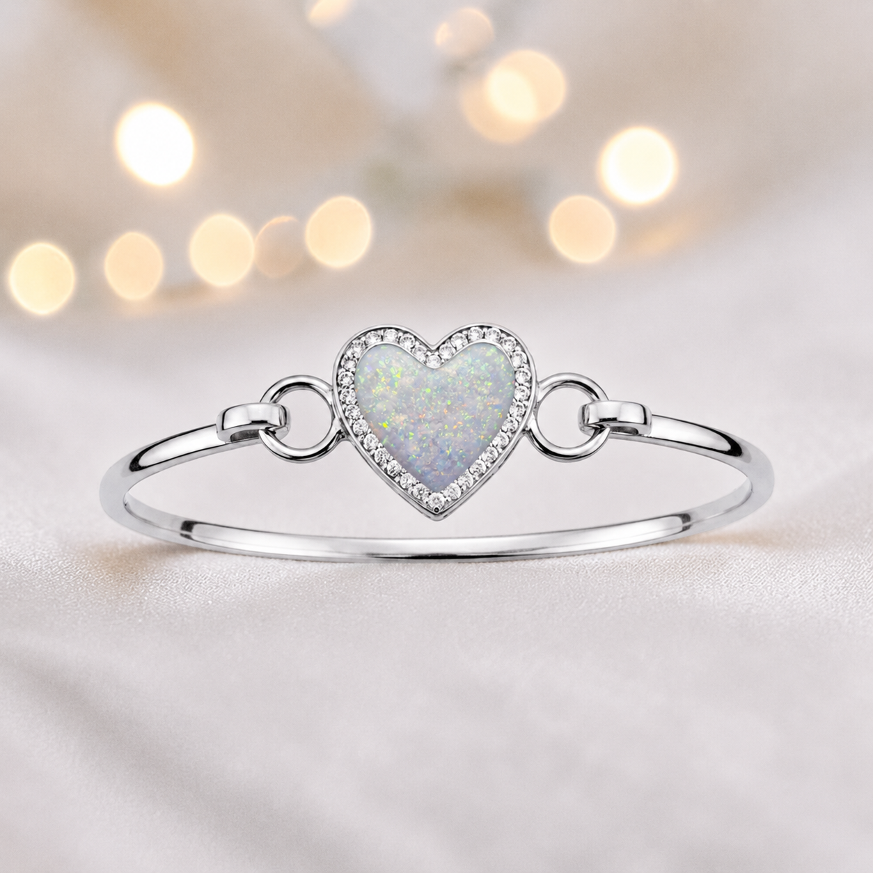 Auriga Heart Bangle — silver heart ashes memorial CZ bangle in white snow, handcrafted in Lancashire, UK - by Keepsake Memorial Jeweller