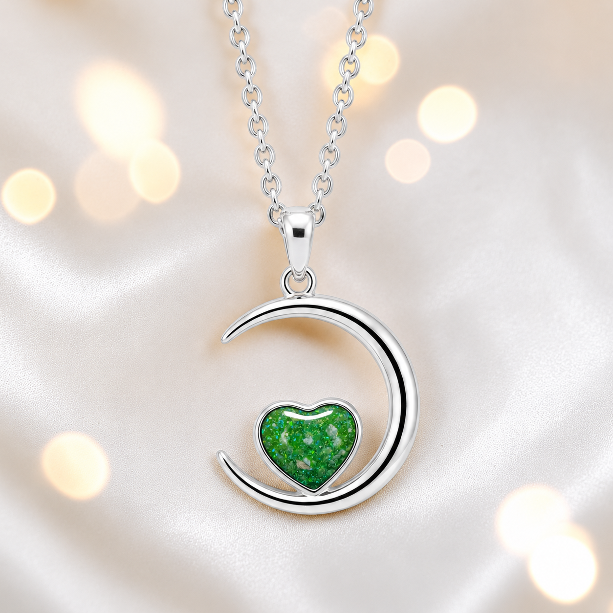 Aveline heart moon ashes pendant in fruit green, handcrafted in Lancashire UK