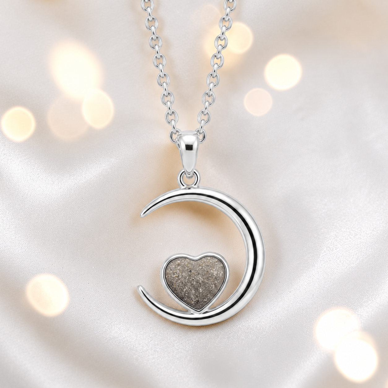 Aveline heart moon ashes pendant in natural ash, handcrafted in Lancashire UK