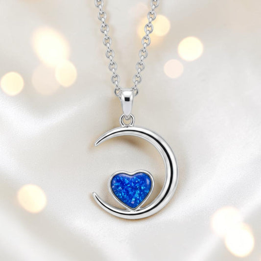 Aveline heart moon ashes pendant in royal blue, handcrafted in Lancashire UK
