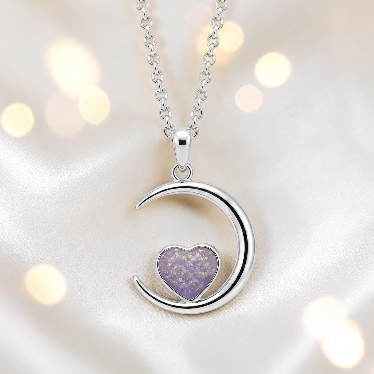 Aveline heart moon ashes pendant in unicorn purple, handcrafted in Lancashire UK