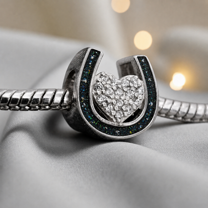 Bella horse shoe ashes charm with CZ heart, close up view, handmade in Lancashire UK - by Keepsake Memorial Jewellery