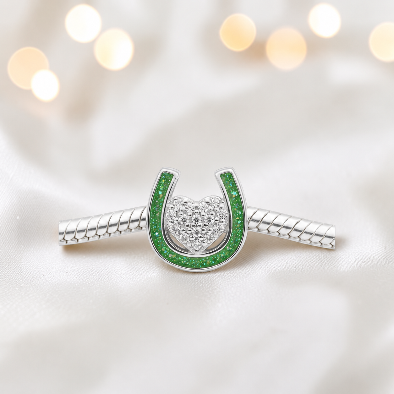 Bella horse shoe ashes charm with CZ heart, in fruit green, handmade in Lancashire UK - by Keepsake Memorial Jewellery