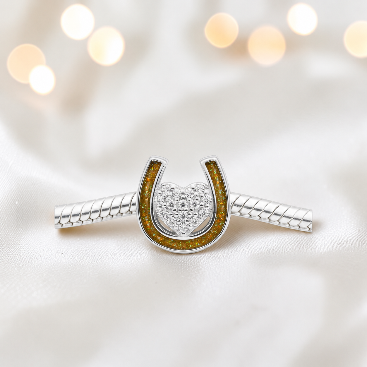Bella horse shoe ashes charm with CZ heart, in gold olive, handmade in Lancashire UK - by Keepsake Memorial Jewellery