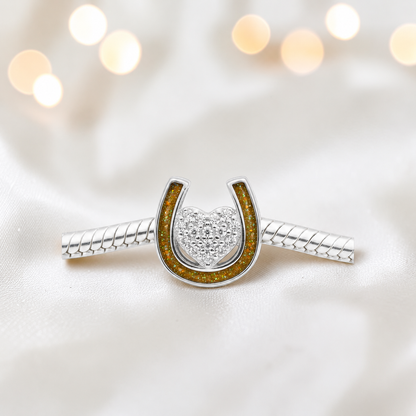 Bella horse shoe ashes charm with CZ heart, in gold olive, handmade in Lancashire UK - by Keepsake Memorial Jewellery