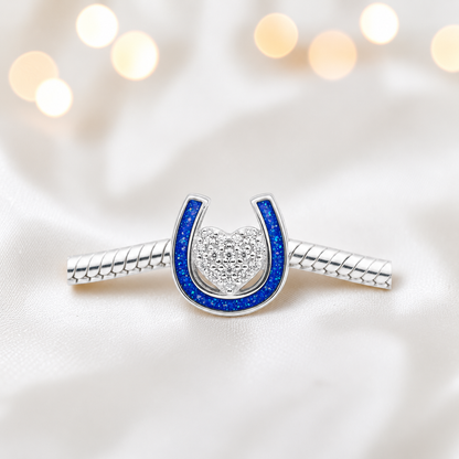 Bella horse shoe ashes charm with CZ heart, in royal blue, handmade in Lancashire UK - by Keepsake Memorial Jewellery