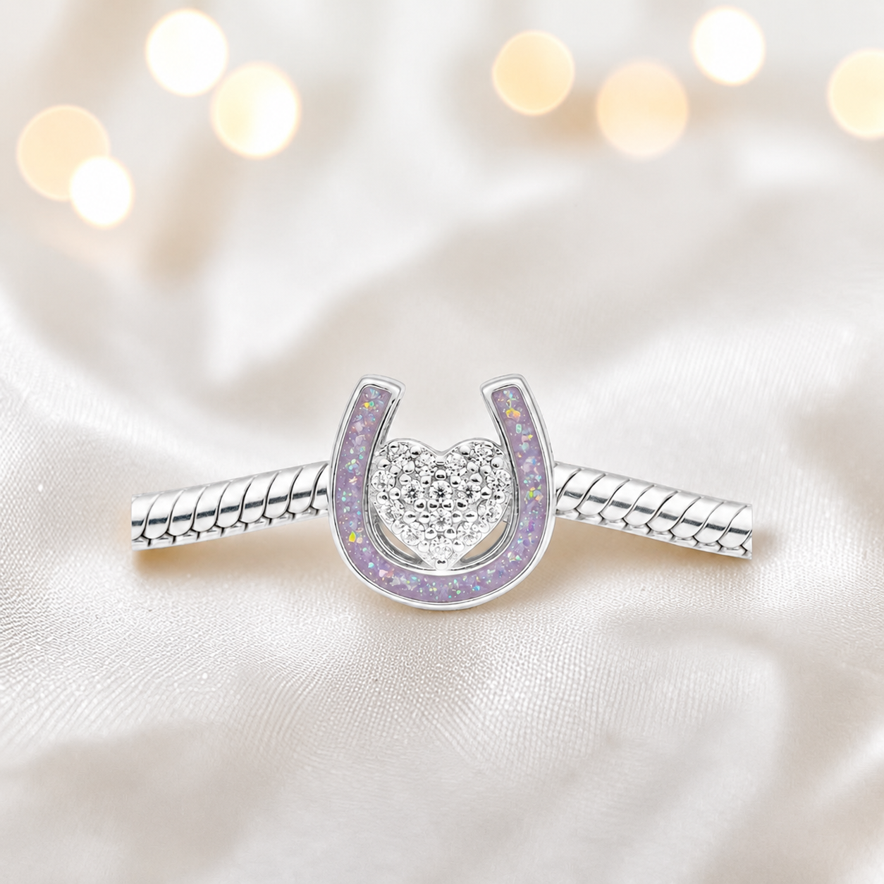 Bella horse shoe ashes charm with CZ heart, in unicorn purple, handmade in Lancashire UK - by Keepsake Memorial Jewellery