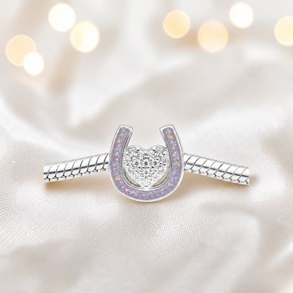 Bella horse shoe ashes charm with CZ heart, in unicorn purple, handmade in Lancashire UK - by Keepsake Memorial Jewellery