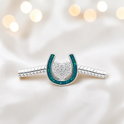 Bella horse shoe ashes charm with CZ heart, in teal mist, handmade in Lancashire UK - by Keepsake Memorial Jewellery