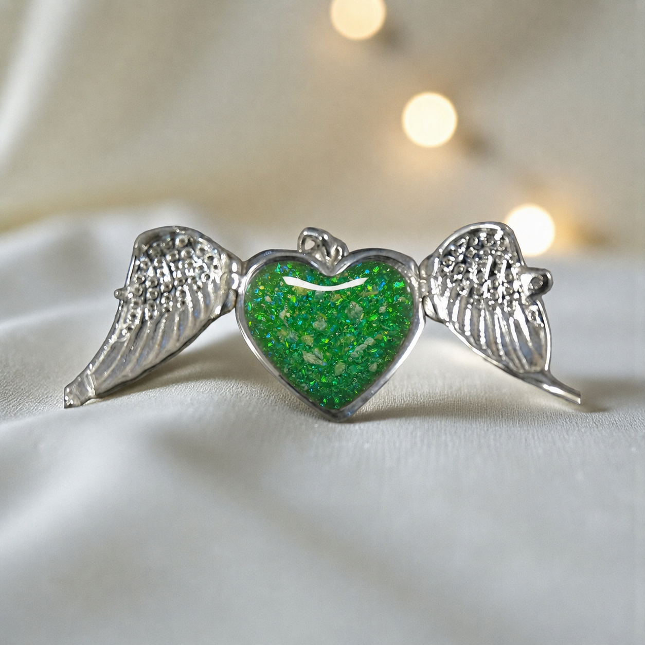 Canopus angel wing memorial pendant in fruit green, handcrafted in Lancashire UK - by Keepsake Memorial Jewellery