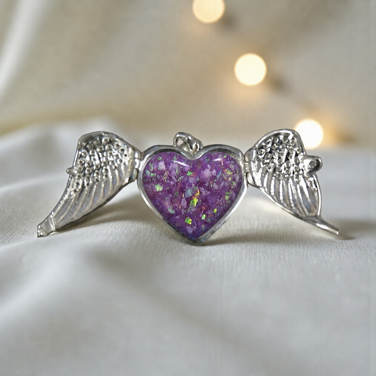 Canopus angel wing memorial pendant in rose pink, handcrafted in Lancashire UK - by Keepsake Memorial Jewellery