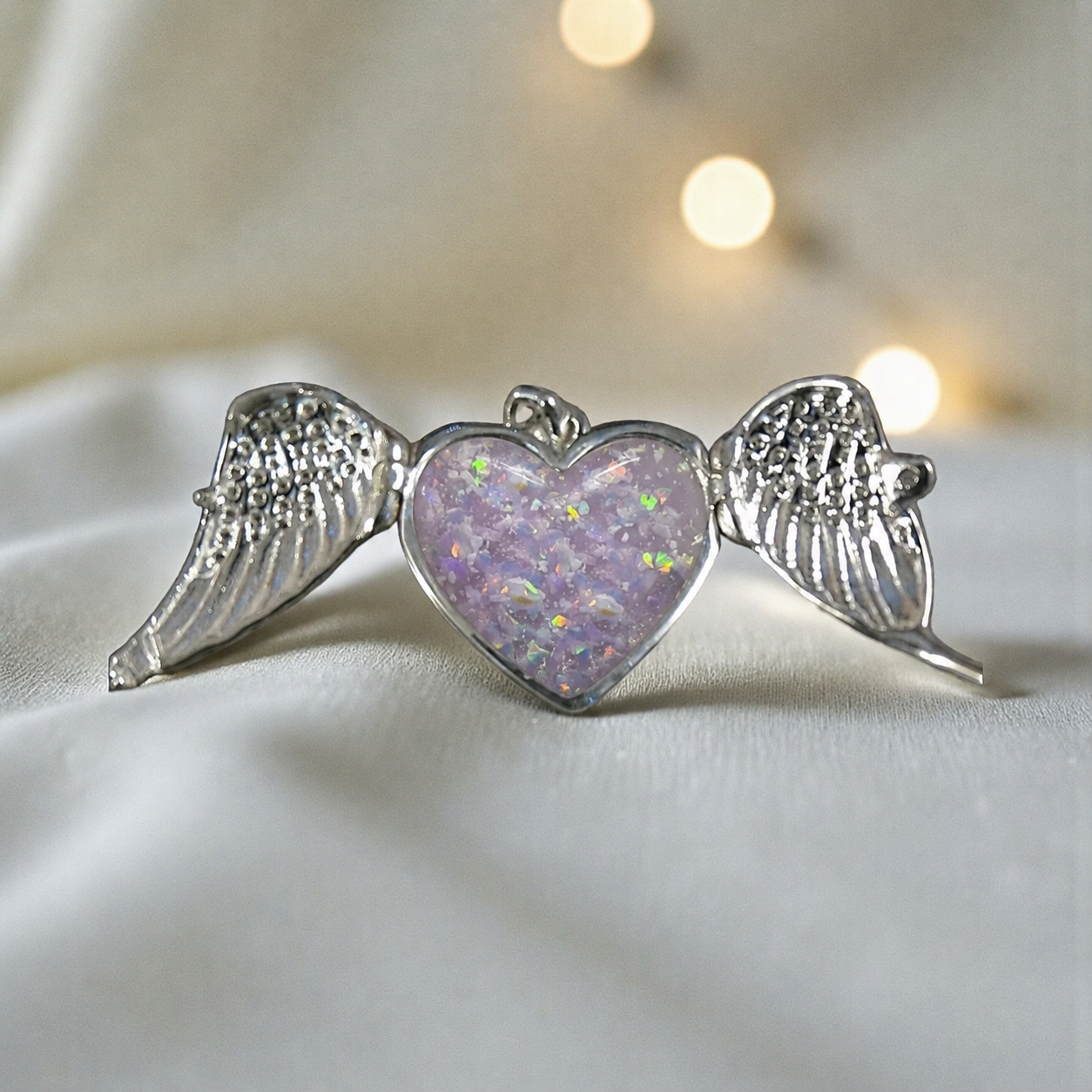 Canopus angel wing memorial pendant in unicorn purple, handcrafted in Lancashire UK - by Keepsake Memorial Jewellery