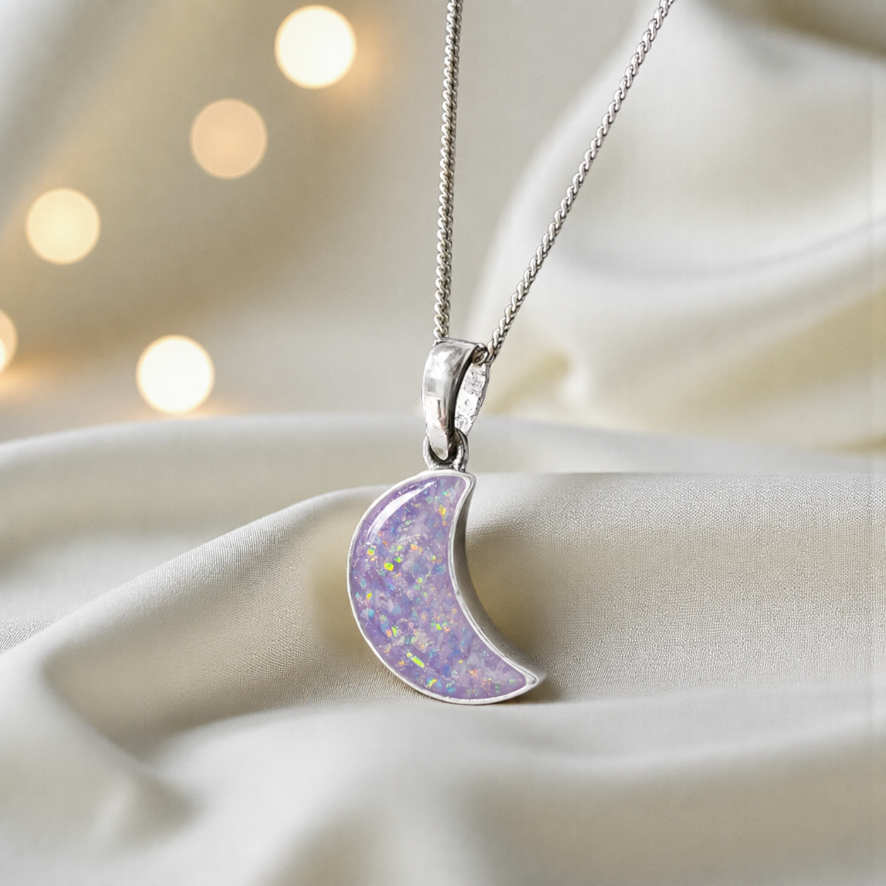 Caph sterling silver moon shaped pendant in unicorn purple, handcrafted in Lancashire UK