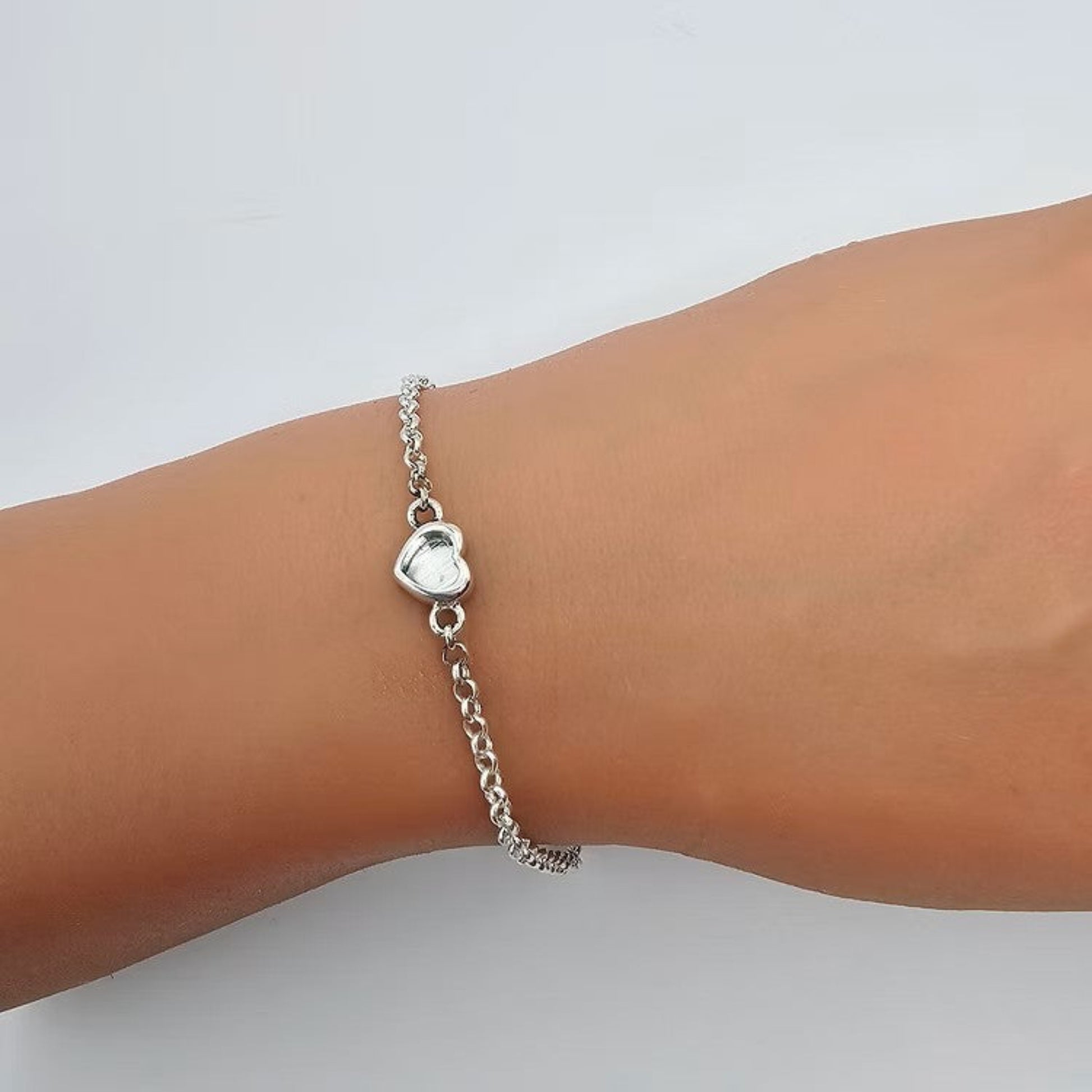 Cassia Bracelet — silver heart ashes memorial bracelet worn on wrist, handcrafted in Lancashire, UK