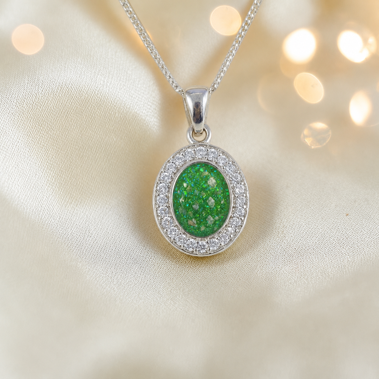 Celae oval ashes pendant in fruit green, handcrafted in Lancashire UK