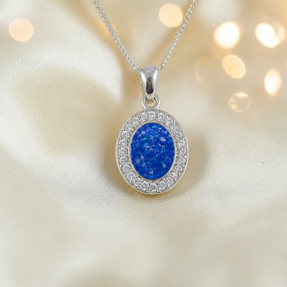 Celae oval ashes pendant in royal blue, handcrafted in Lancashire UK