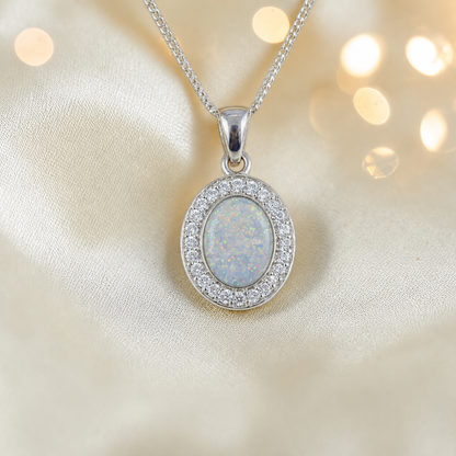 Celae oval ashes pendant in white snow, handcrafted in Lancashire UK