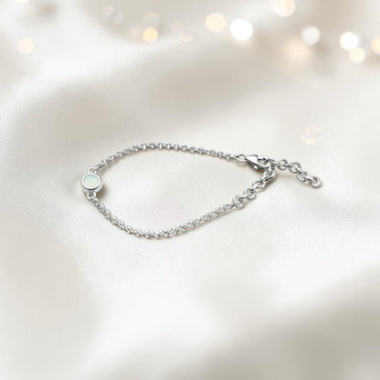 Celestia Bracelet — silver round belcher ashes memorial bracelet in white snow, handcrafted in Lancashire, UK