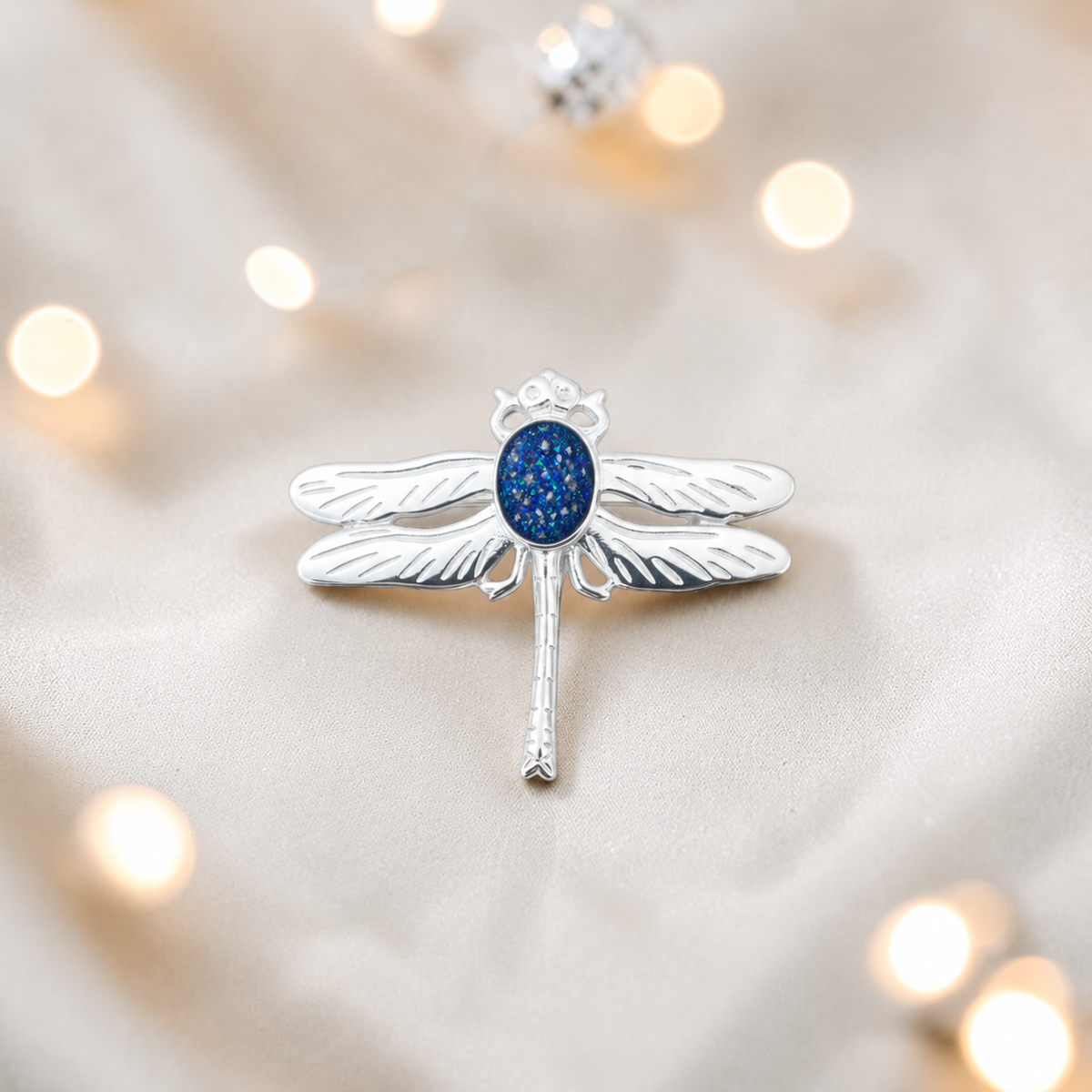 Celestial brooch - sterling silver ashes memorial brooch in sapphire glow, handcrafted in Lancashire UK - by Keepsake Memorial Jewellery