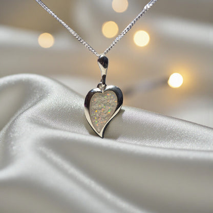 Deneb silver curved heart ashes pendant handcrafted in Lancashire UK