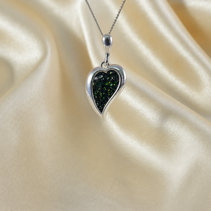 Deneb curved heart silver ashes pendant in black flame, handcrafted in Lancashire UK