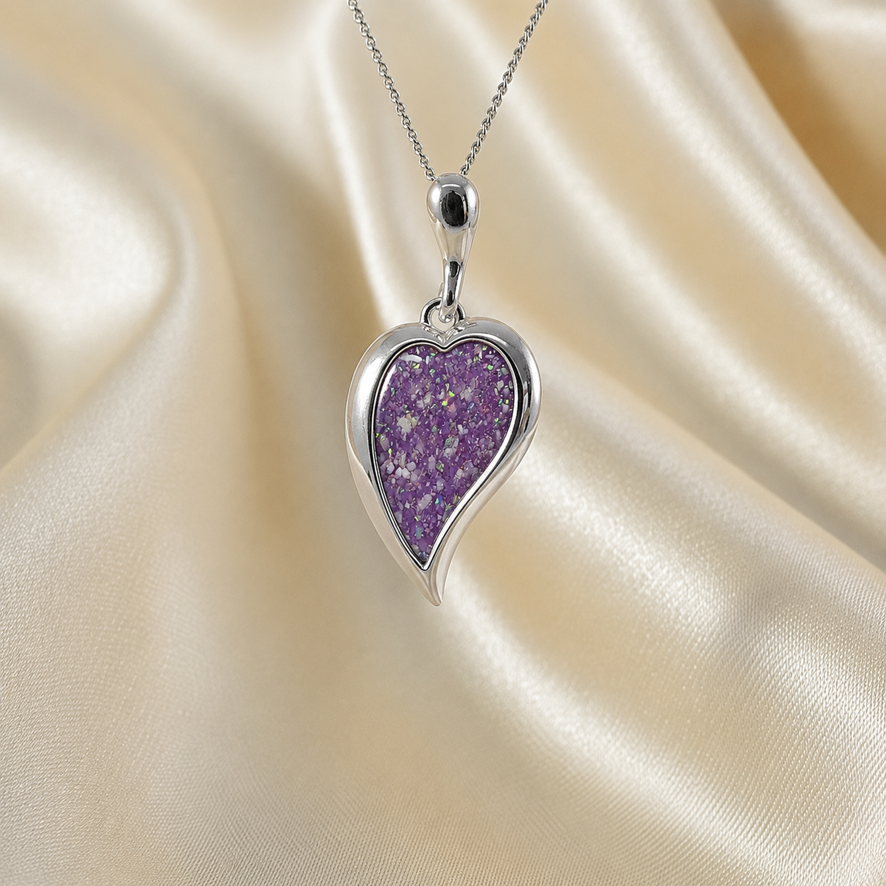 Deneb curved heart silver ashes pendant in rose pink, handcrafted in Lancashire UK
