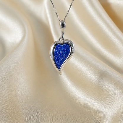Deneb curved heart silver ashes pendant in royal blue, handcrafted in Lancashire UK