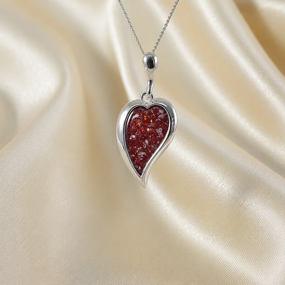 Deneb curved heart silver ashes pendant in ruby red, handcrafted in Lancashire UK