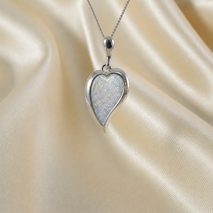 Deneb curved heart silver ashes pendant in white snow, handcrafted in Lancashire UK
