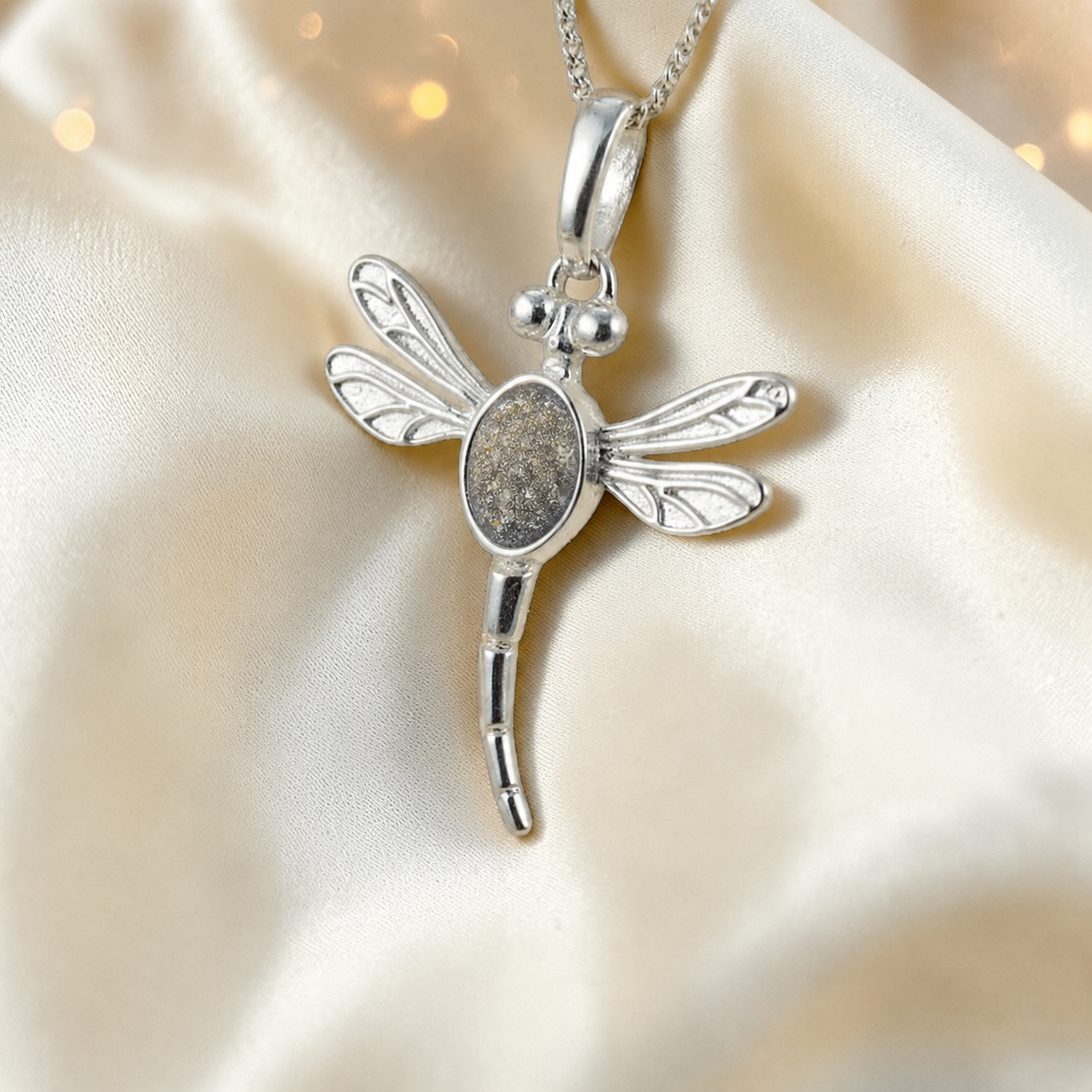 Dubhe dragonfly silver ashes pendant in natural ash, handcrafted in Lancashire UK - by Keepsake Memorial Jewellery