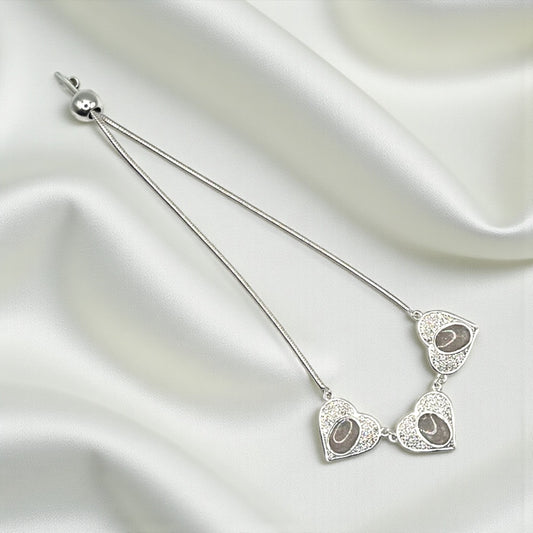 Elara Bracelet — silver three heart ashes memorial bracelet, handcrafted in Lancashire, UK - by Keepsake Memorial Jewellery