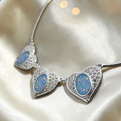 Elara Bracelet — silver three heart ashes memorial bracelet, in baby blue, handcrafted in Lancashire, UK - by Keepsake Memorial Jewellery