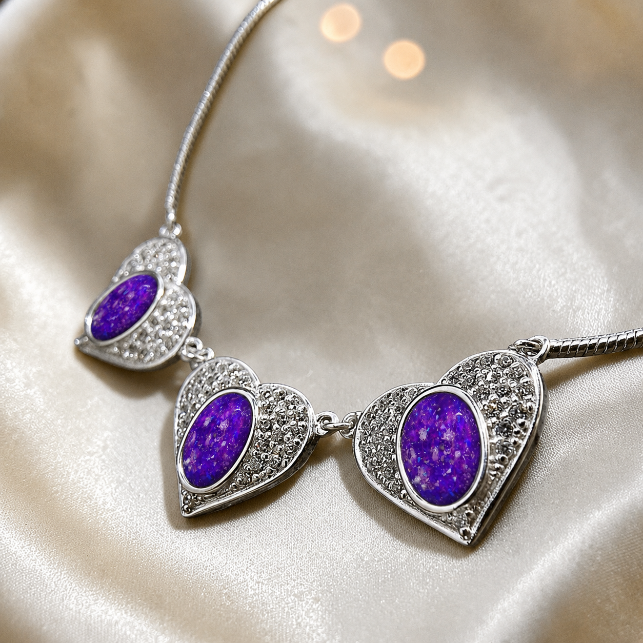 Elara Bracelet — silver three heart ashes memorial bracelet, in sleepy lavender, handcrafted in Lancashire, UK - by Keepsake Memorial Jewellery