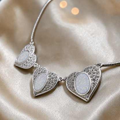 Elara Bracelet — silver three heart ashes memorial bracelet, in white snow, handcrafted in Lancashire, UK - by Keepsake Memorial Jewellery