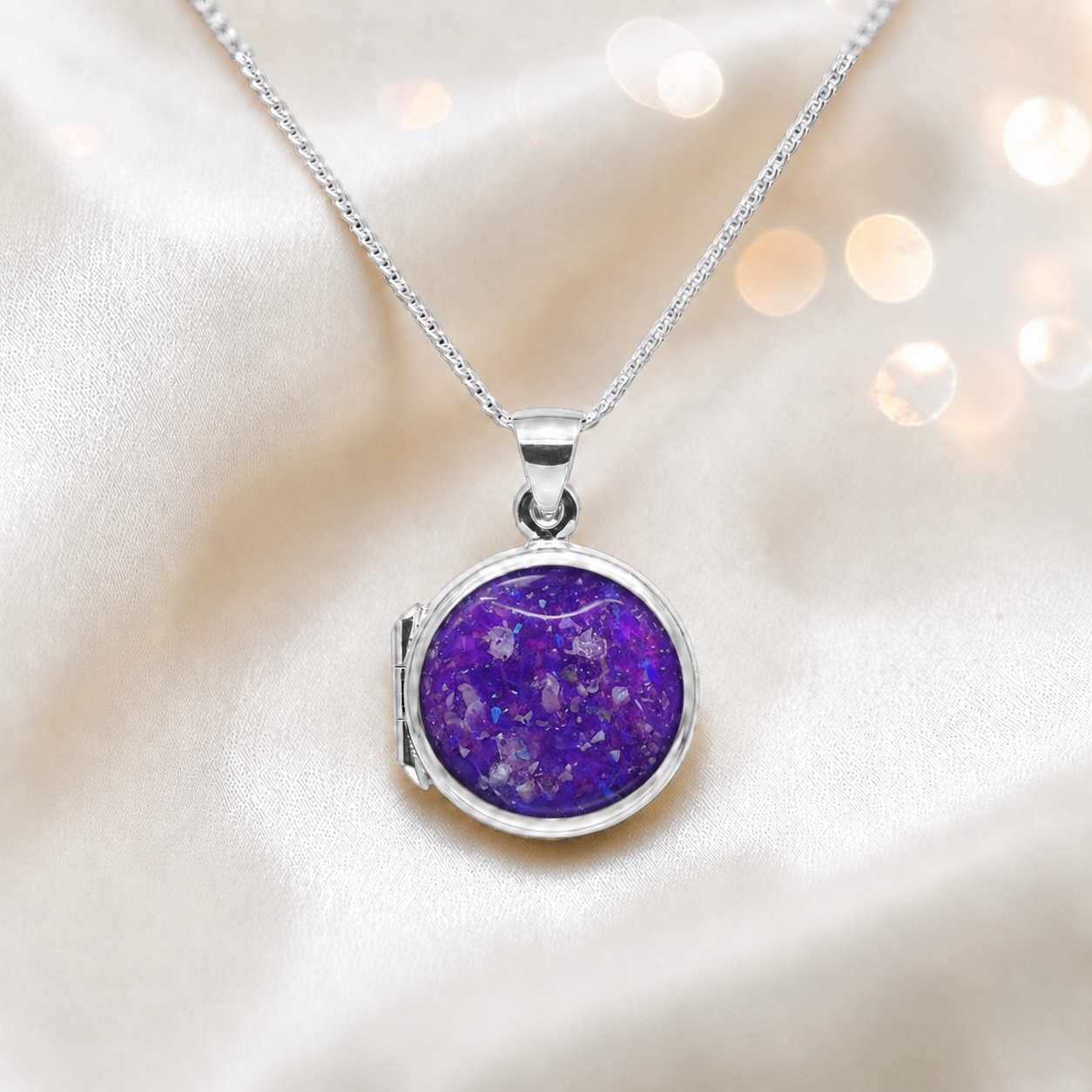 Electra round memorial locket in sterling silver, shown here in sleepy lavender, handcrafted in Lancashire UK - by Keepsake Memorial Jewellery