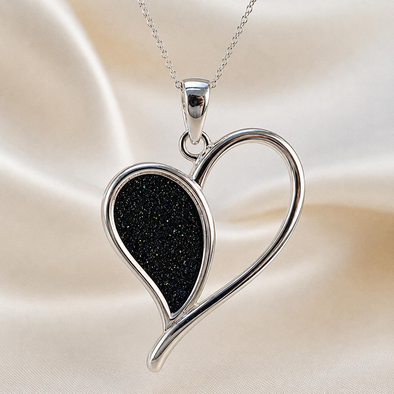 Elnath heart ashes pendant in black flame, handcrafted in Lancashire UK