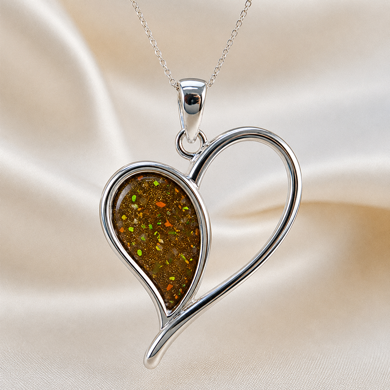 Elnath heart ashes pendant in gold olive, handcrafted in Lancashire UK