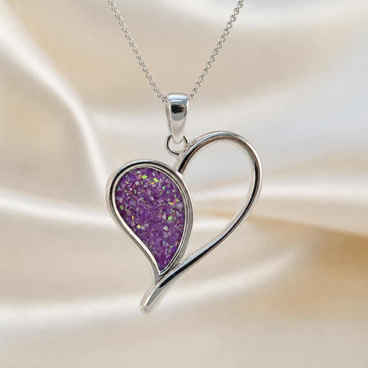 Elnath heart ashes pendant in rose pink, handcrafted in Lancashire UK