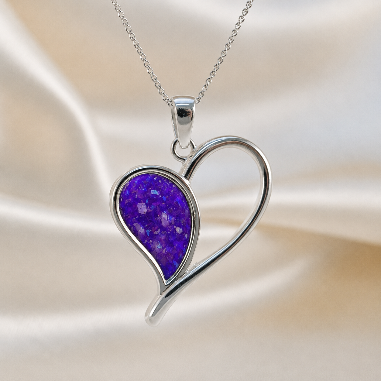 Elnath heart ashes pendant in sleepy lavender, handcrafted in Lancashire UK