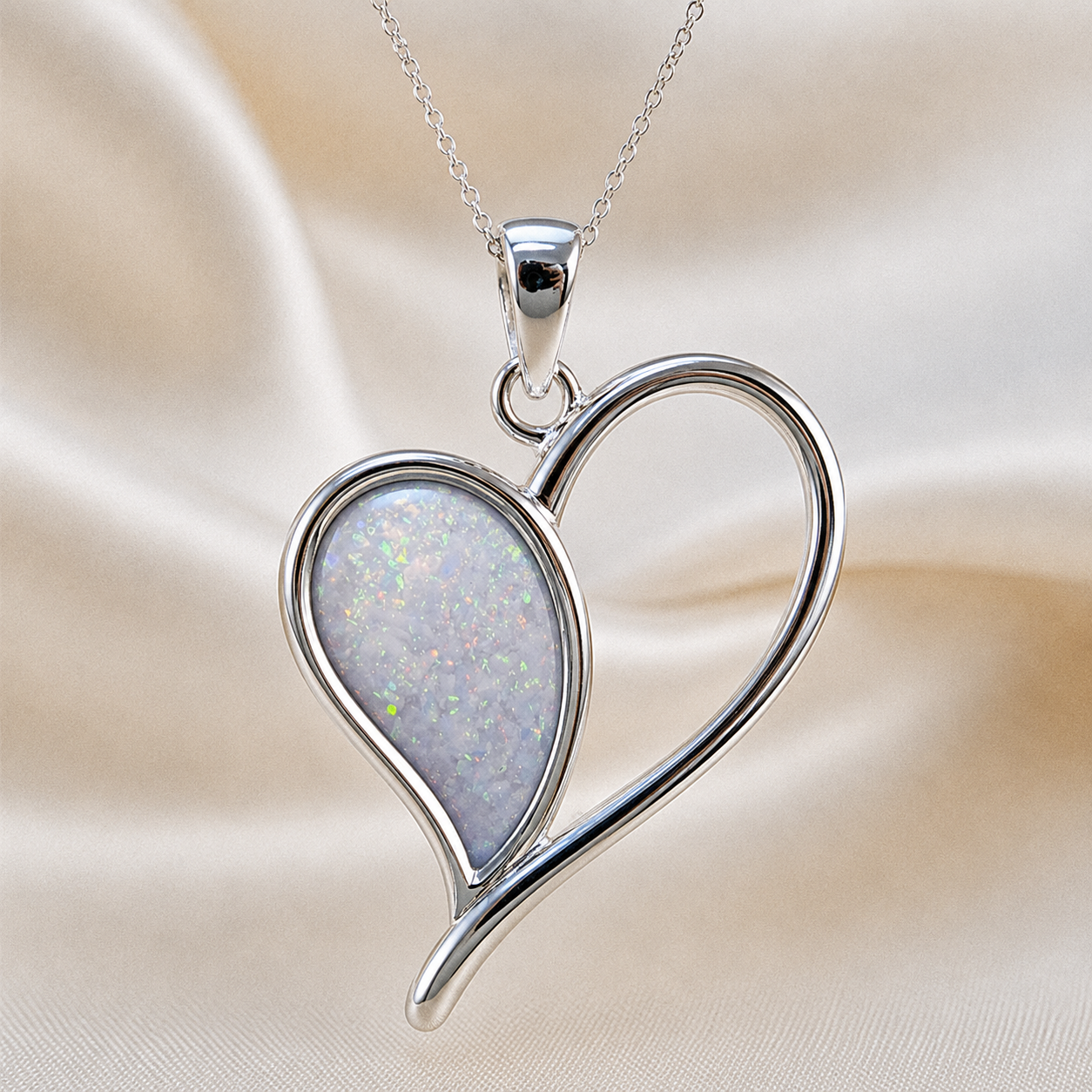 Elnath heart ashes pendant in white snow, handcrafted in Lancashire UK