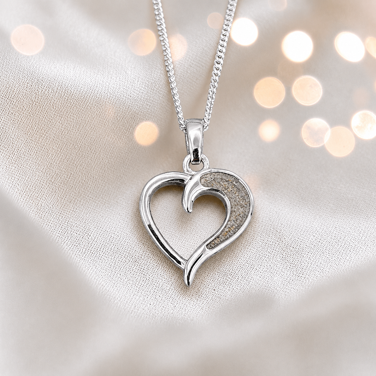 Enif Heart Ashes Pendant with natural ash in single side recess, handcrafted in Lancashire UK