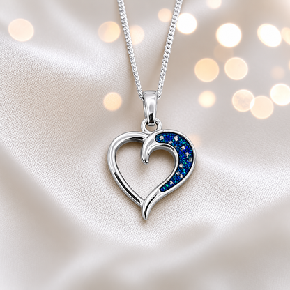 Enif Heart Ashes Pendant with sapphire glow in single side recess, handcrafted in Lancashire UK