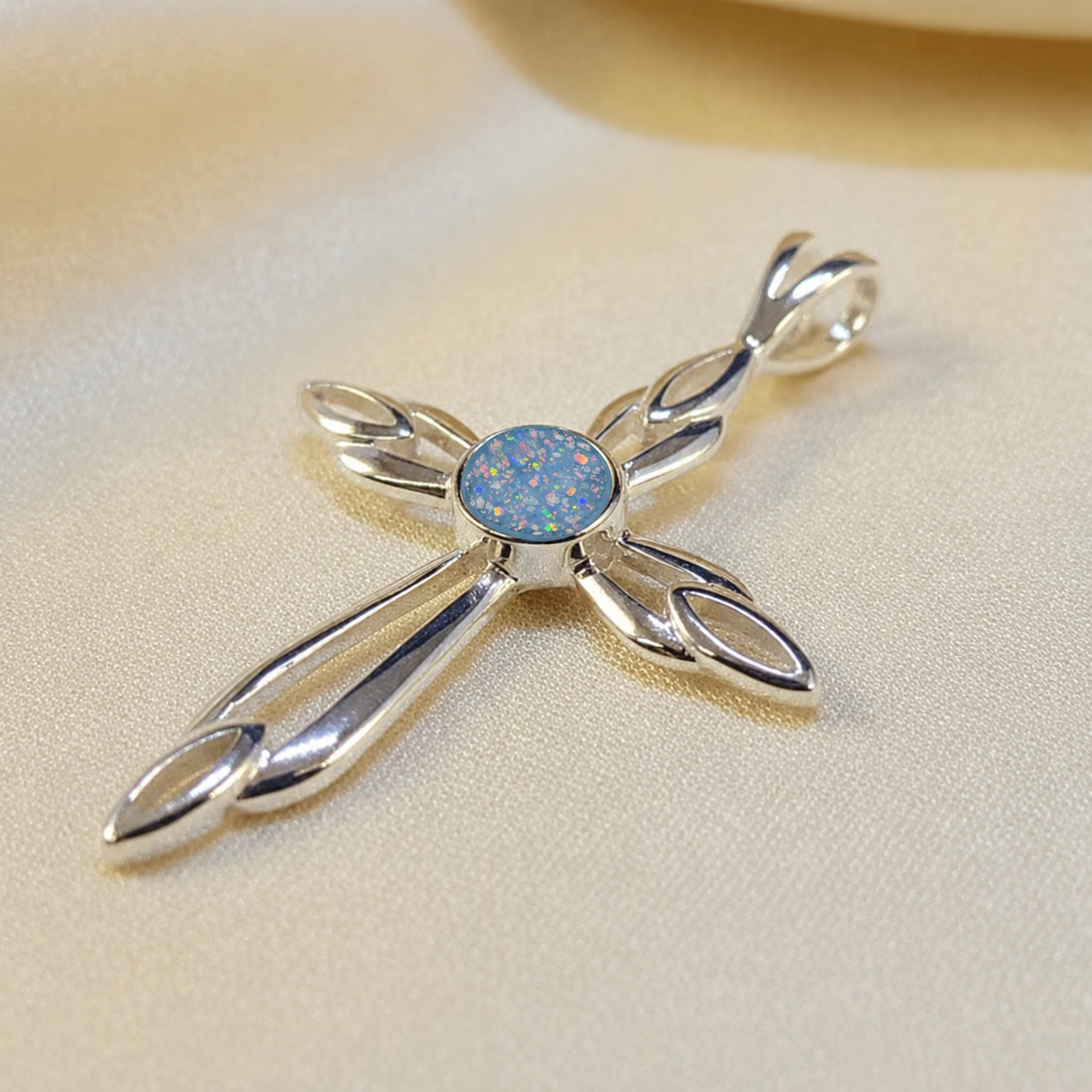 Errai sterling silver memorial cross pendant in baby blue, handcrafted in Lancashire UK - by Keepsake Memorial Jewellery
