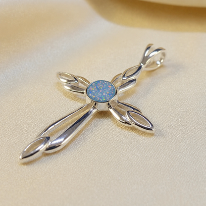 Errai sterling silver memorial cross pendant in baby blue, handcrafted in Lancashire UK - by Keepsake Memorial Jewellery