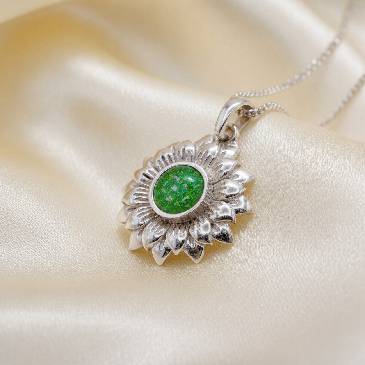 Flora sunflower silver ashes pendant in fruit green, handcrafted in Lancashire UK