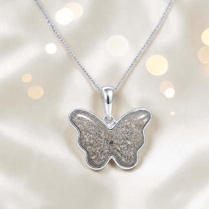 Foma butterfly memorial pendant in natural ash, handcrafted in Lancashire UK - by Keepsake Memorial Jewellery