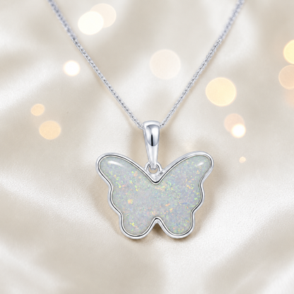 Foma butterfly memorial pendant in white snow, handcrafted in Lancashire UK - by Keepsake Memorial Jewellery