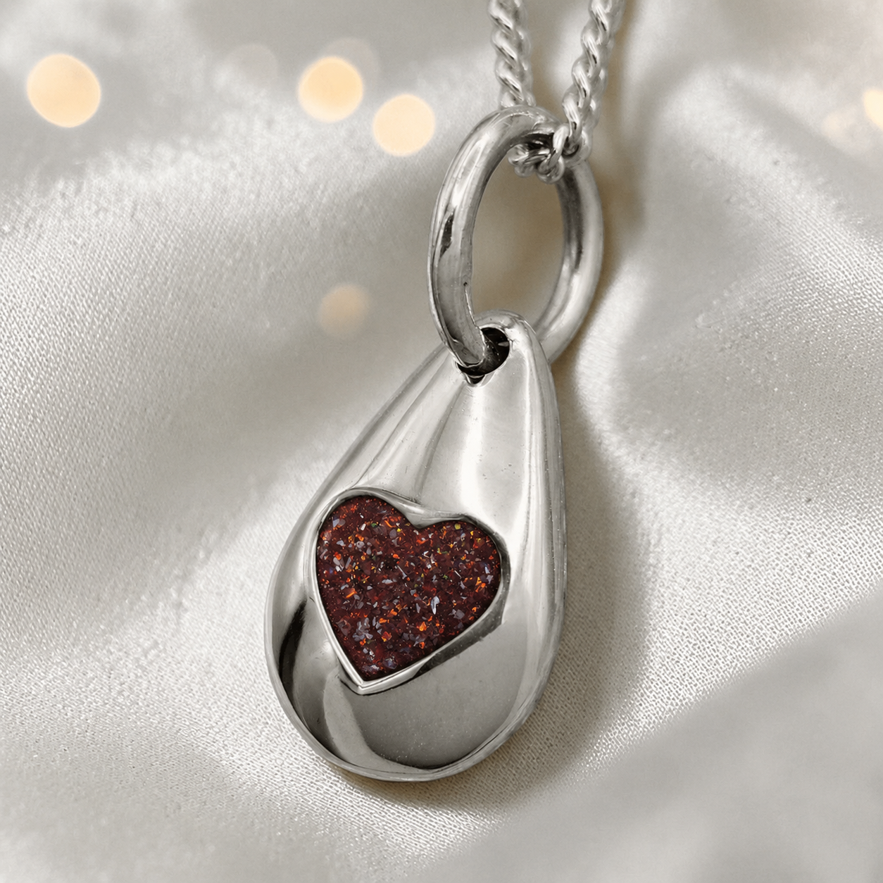 Gacrux pebble shaped pendant with heart memorial stone in copper mocha, handcrafted in Lancashire UK - by Keepsake Memorial Jewellery